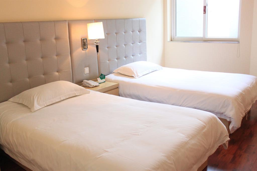 Qingdao Renjia Bussiness Hotel 部屋 写真