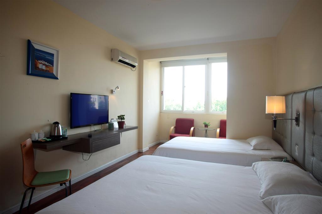 Qingdao Renjia Bussiness Hotel エクステリア 写真